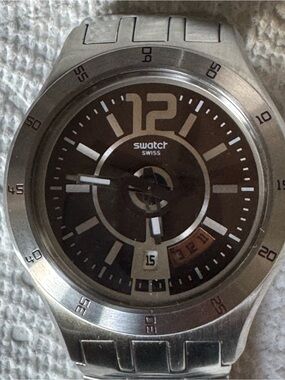 Swatch Men's Silver Stainless Steel Watch with Brown Dial